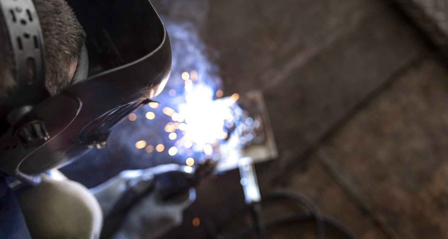 male-mechanic-working-his-workshop